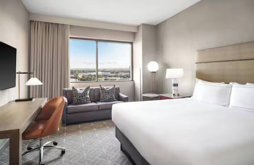 Richardson Hotel | Relax, Swim & Recharge: Hotel-Style Stay with Pool & 24-hour Fitness Center
