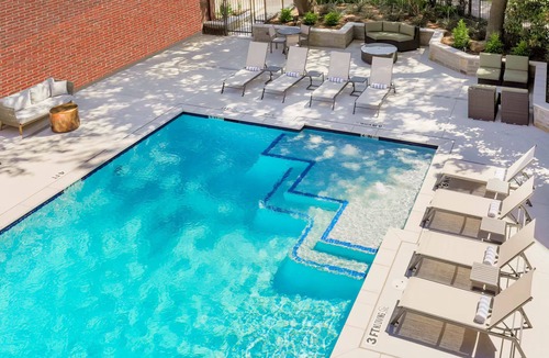 Richardson Hotel | Relax, Swim & Recharge: Hotel-Style Stay with Pool & 24-hour Fitness Center