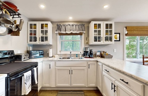 Castleton House | Relaxing, cozy, lakefront home with secluded deck, dock & direct lake access