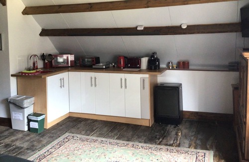 Saint-Cyr-du-Bailleul Apartment | Relaxing, tranquil studio space within a large garden, huge bed. Good internet