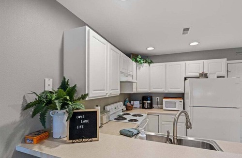 Camdenton Condo | Relaxing Lakefront Condo w/2 Heated Pools, Boat Ramp & Slip, Near Golf & Parks