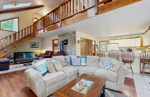 Bumpass House | Relaxing lakeside retreat with boathouse, dock, deck, firepit and screened porch