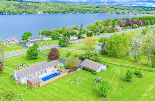 Town of Milo House | Relaxing Lakeview Retreat! Pool, Hot Tub, Firepit, Gameroom Perfect for Groups,