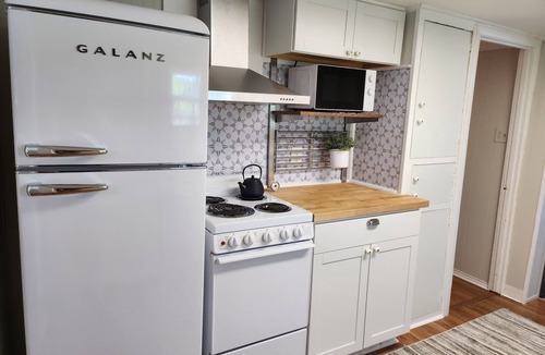 Warsaw Cottage | Relaxing Riverfront, Private Dock, & Hot Tub