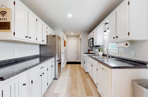Town of Benton House | Relaxing two-story home with a deck, firepit, game room, & washer/dryer