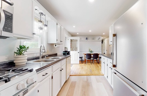 Town of Benton House | Relaxing two-story home with a deck, firepit, game room, & washer/dryer