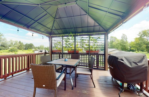 Town of Benton House | Relaxing two-story home with a deck, firepit, game room, & washer/dryer