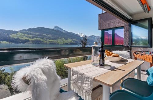 Ingenbohl Apartment | ReMo I 4 Seasons Apartment I 1-4 Personen I See, Bergsicht I 65' Smart TV, Tischkicker und Badewanne I Parkplatz