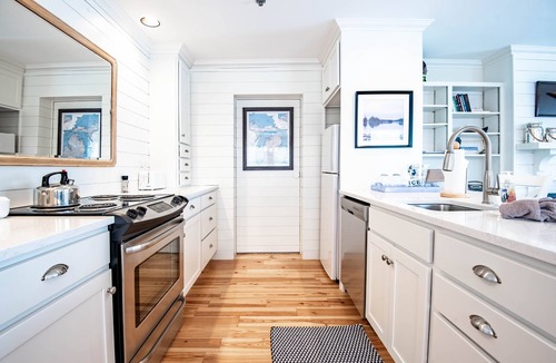 Boyne City Condo | Remodeled Lake Charlevoix Condo | First Floor Beachside Comfort | Fireplace