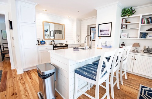 Boyne City Condo | Remodeled Lake Charlevoix Condo | First Floor Beachside Comfort | Fireplace