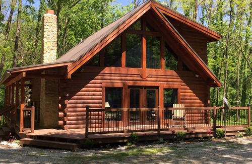 Waveland Cabin | Remodeled Log Cabin Surrounded By 6000 Acres and includes a Nordic Spa!