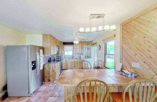 Onekama House | Remodeled, waterfront home on Portage Lake with dock & firepit - 2 dogs OK