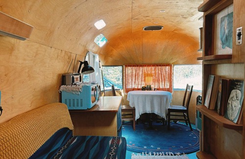 Oklahoma City House | Renovated 1976 Airstream Argosy, A Wooded Retreat in Oklahoma City