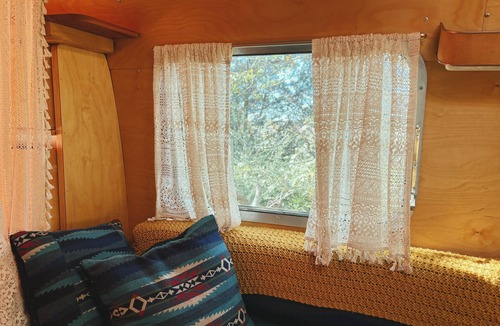 Oklahoma City House | Renovated 1976 Airstream Argosy, A Wooded Retreat in Oklahoma City