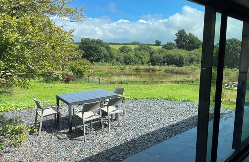 Milford Haven House | Renovated Barn with Pond View