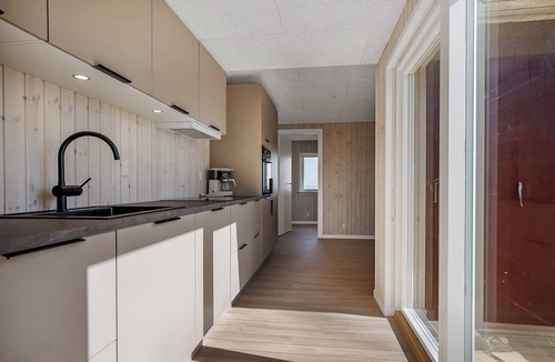 Sjølund House | Renovated beach house with unique location