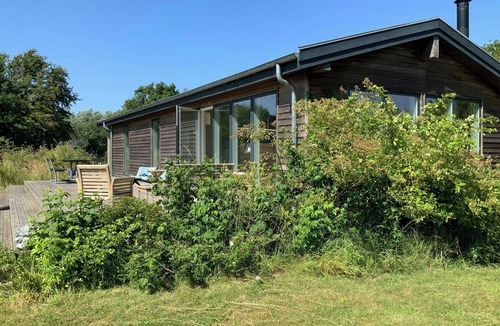 Sklskr House | Renovated holiday home with sea view on Agersø