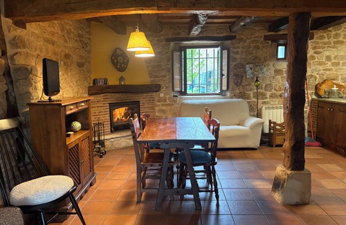 Sedano House | Renovated house with 2 bedrooms, 1 bathroom and living-dining room in stone and wood is very cozy.