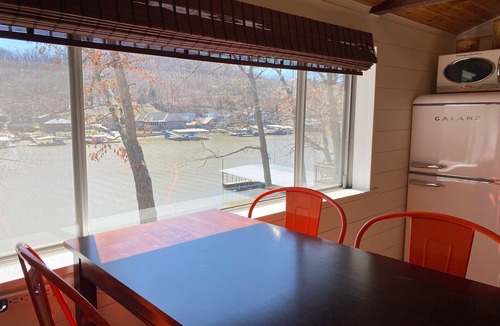 Camdenton Cabin | Renovated lakeside cabin with pool & resort amenities!