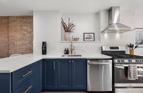 The Village House | Renovated townhome in Downtown Jersey City w Backyard patio