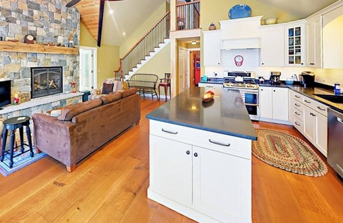 Lamoine Beach Cabin | Renovated waterfront cottage with expansive deck, multiple fireplaces, & grill