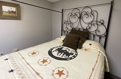 Bandera House | Rent a private room in a hostel type building with 1 queen bed for 2 adults.