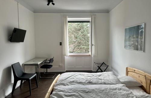Gundeldingen House | Replica's Gästezimmer