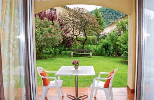 Caslano Apartment | Residenza Parcolago Apt 018 mit Garten by Interhome