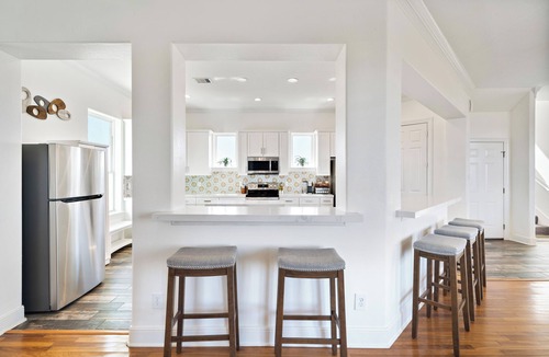 Red Fish Cove House | Resort experience on the West End with stunning sunsets over the Bay