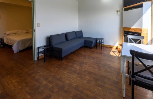 Neebing Apartment | Resort room with two beds and a full kitchen and hottub access