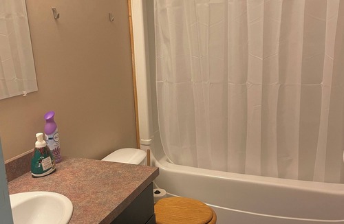 Neebing Apartment | Resort room with two beds and a full kitchen and hottub access