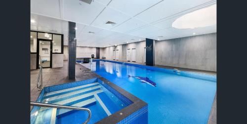 Clyde Apartment | Resort-Style 2BR Escape Pool, Gym, Sauna, Parking