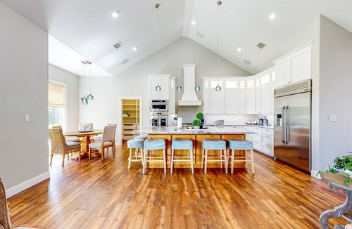 Waller House | Resort-style oasis with swimming pond, beach, tropical hut & bar