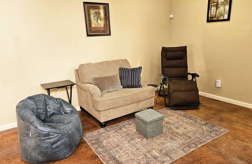 Fletcher Apartment | Rest, Rejuvenate, and Renew in our cozy Relaxation Room