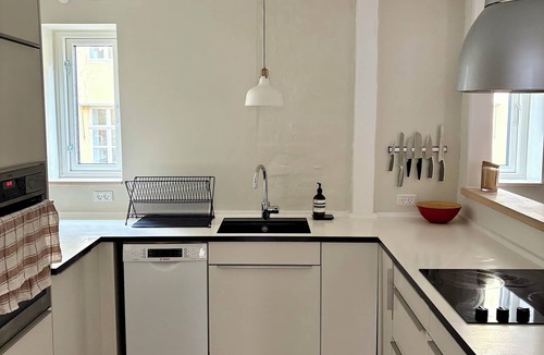 Copenhagen K Apartment | Restored 1880 Grain Warehouse in Peaceful Courtyard Near Royal Palace & Church
