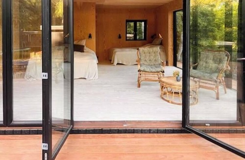 Udsholt House | Retro woodland home with modern twist amidst trees
