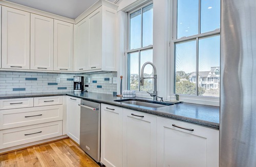 South Beach House | Reverse floor plan home with ocean views, updated kitchen and bathrooms!