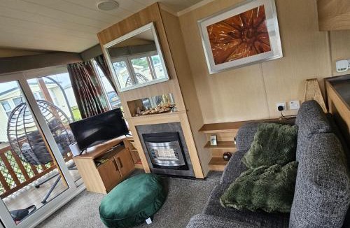 Rhyl House | Rhyl Caravan with Veranda Egg Chairs & Garden