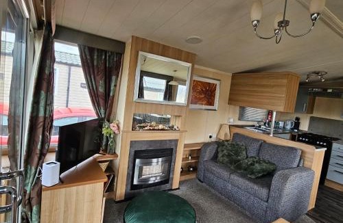 Rhyl House | Rhyl Caravan with Veranda Egg Chairs & Garden