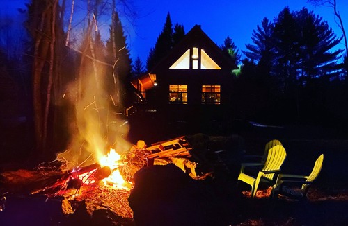 Stark Cabin | Ride right from this trailside cozy cabin in the woods with private pond.