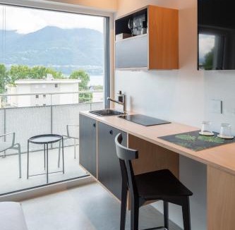 Minusio Hotel | Riva Rooms & Studios - Check-In 24hr