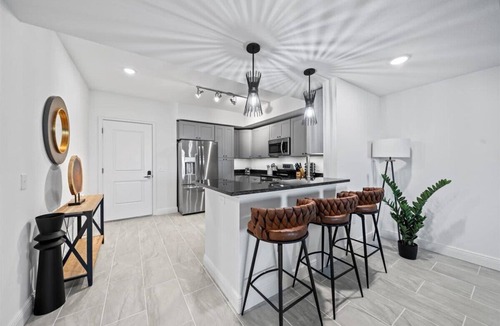 Merritt Island Condo | River Fly-In Duo | 4BR | Runway View