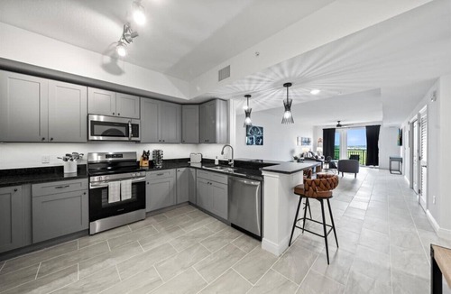 Merritt Island Condo | River Fly-In Duo | 4BR | Runway View