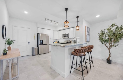 Merritt Island Condo | River Fly-In Duo - 4Bd - Garden View