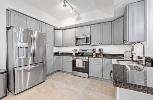 Merritt Island Condo | River Fly-In Duo - 4BR - Launch View