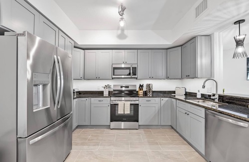 Merritt Island Condo | River Fly-In Duo - 4BR - Launch View