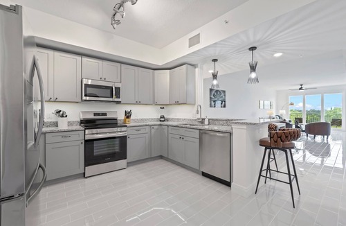 Merritt Island Condo | RIVER FLY IN: The Cocoa, River & Runway View