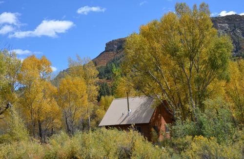 Pagosa Springs Cabin | River home: log cabin on San Juan River MONTH-to-MONTH only=31 day minimum stay