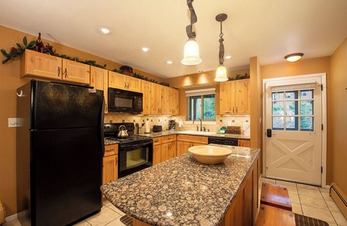Winter Park Condo | River view from private deck, 2 bedroom modern interior