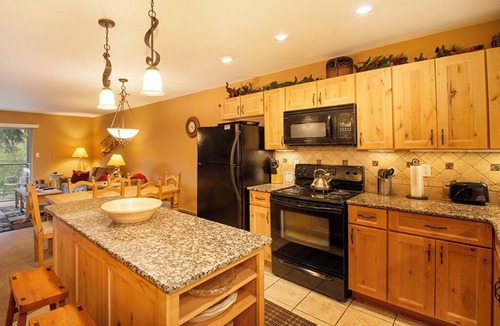 Winter Park Condo | River view from private deck, 2 bedroom modern interior